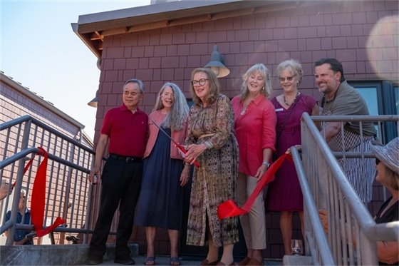 Mayor and Town Council cutting ribbon.